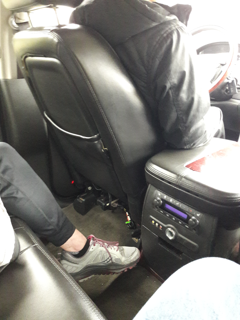 Visible wires under seat, ripped seat back pocket